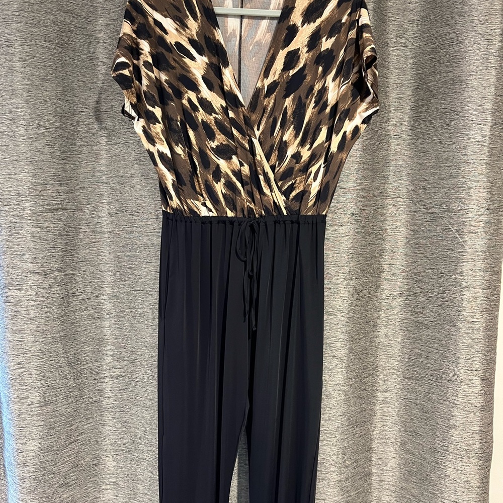 Kardashian. Leopard/ Black jumpsuit. Thin, silky material. Size Small.